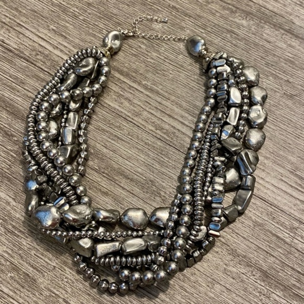 Satin silver choker looks fantastic in person. Can be adjusted from 16” to 17”